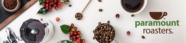 Image looking down on Paramount Roasters coffee beans, roasted coffee, ground coffee, and a cup of freshly brewed coffee